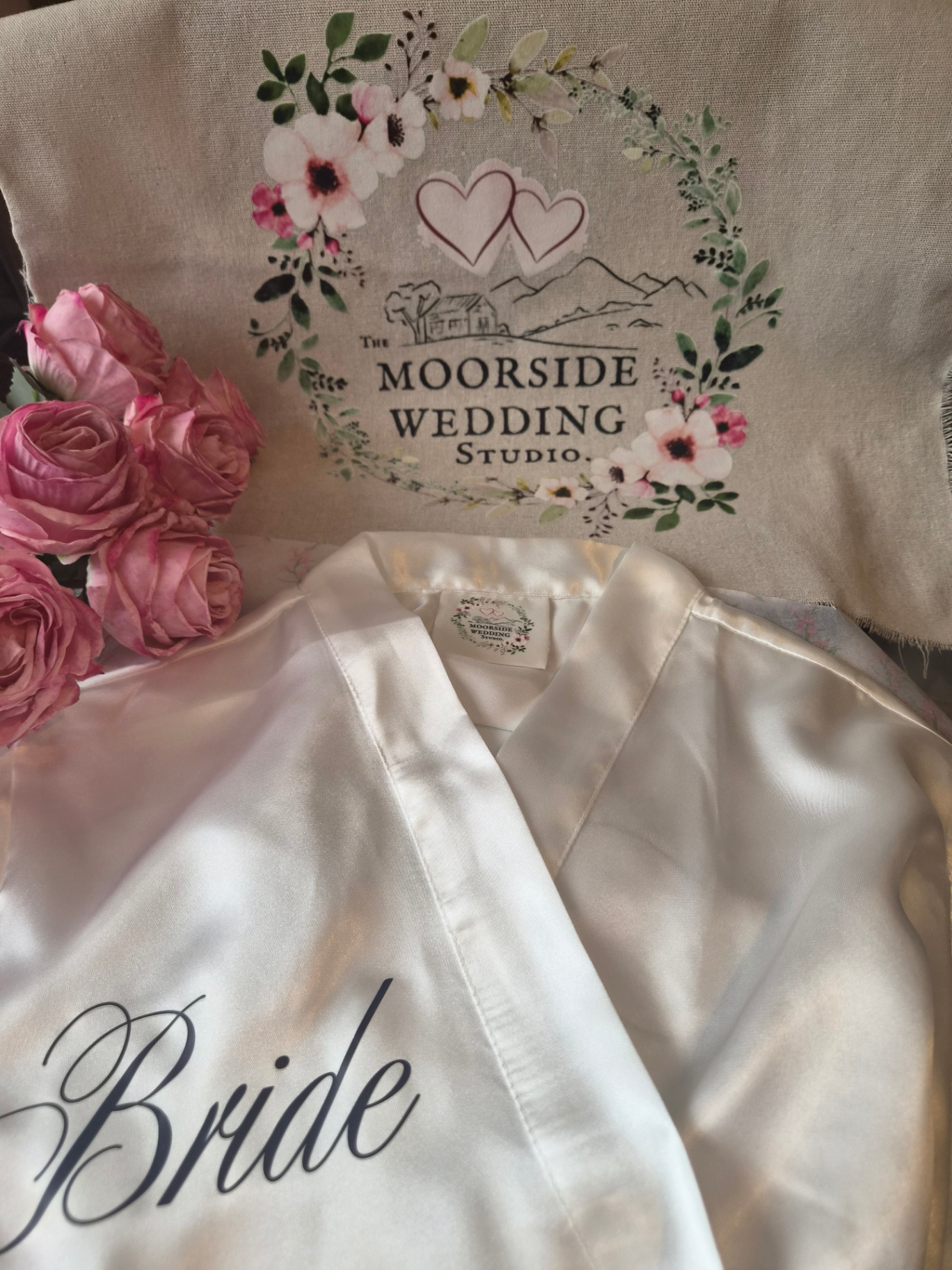 Moorside Wedding Studio satin bride robe and branded linen wedding cushion by Moorside Studio